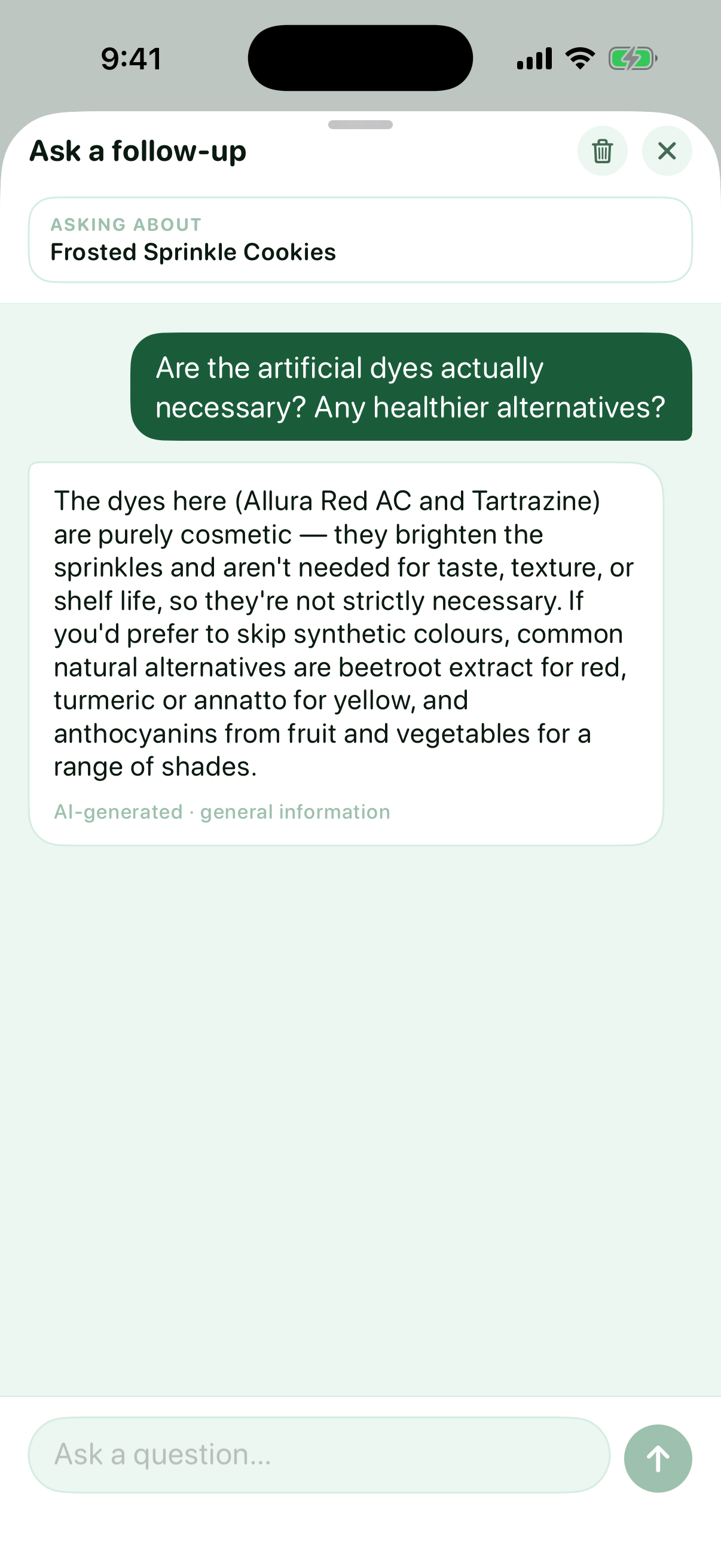 Myredient follow-up chat for a Frosted Sprinkle Cookies scan: the question 'Are the artificial dyes actually necessary? Any healthier alternatives?' is answered in plain language — the dyes are cosmetic and not strictly necessary, with beetroot, turmeric, and annatto suggested as natural alternatives — under an 'AI-generated · general information' label.